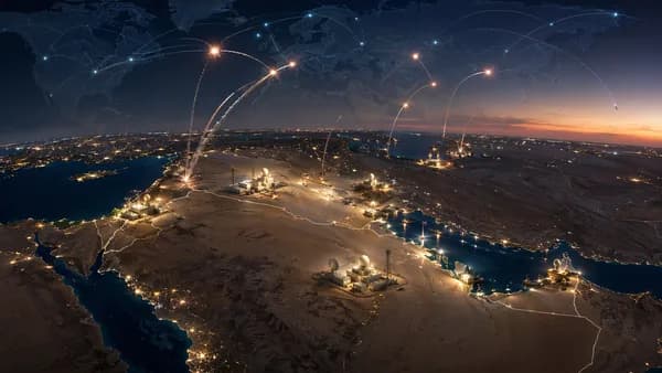 Night aerial view of Middle East with interception trails, radar sites, and global connection lines.