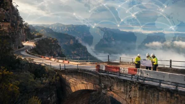 Closed Blue Mountains highway and cracked stone bridge with engineers and global map overlay.