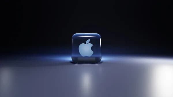 a small blue cube with a white logo on it