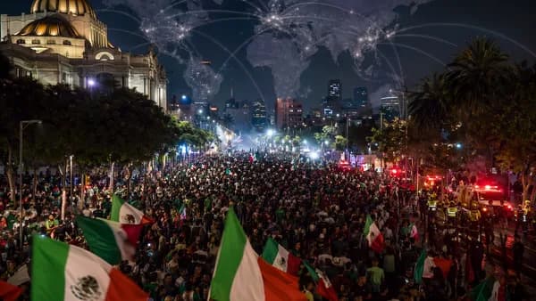 Dense Mexico City celebration crowd at night with emergency response and global map overlay
