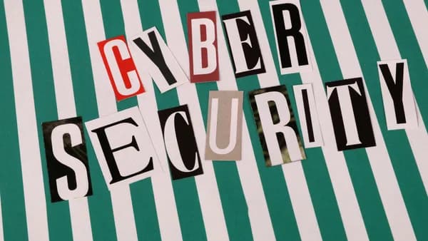 Cyber security concept depicted with a creative text collage on striped background.