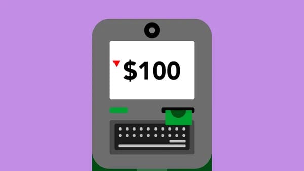 Decorative cardboard applique of automated teller machine with number and dollar symbol on display on violet background