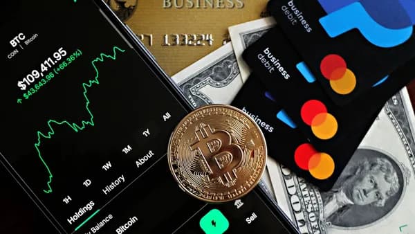 A dynamic image showcasing Bitcoin, credit cards, and financial apps for investment enthusiasts.
