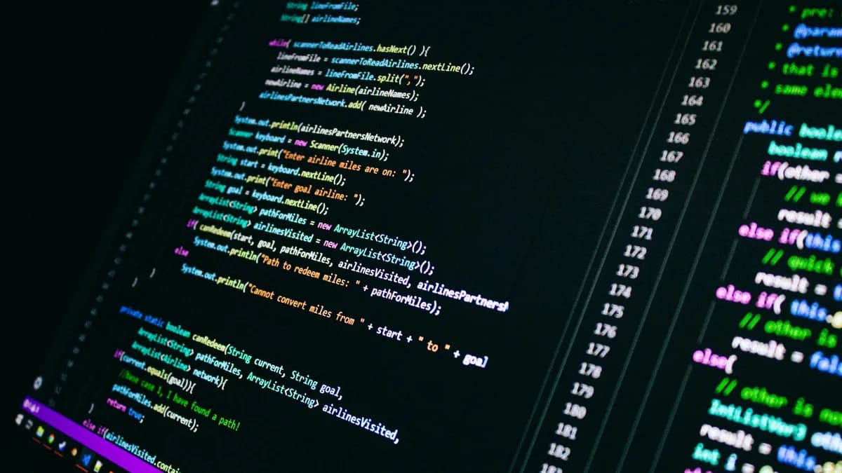 Close-up of colorful programming code on a computer screen, showcasing digital technology.