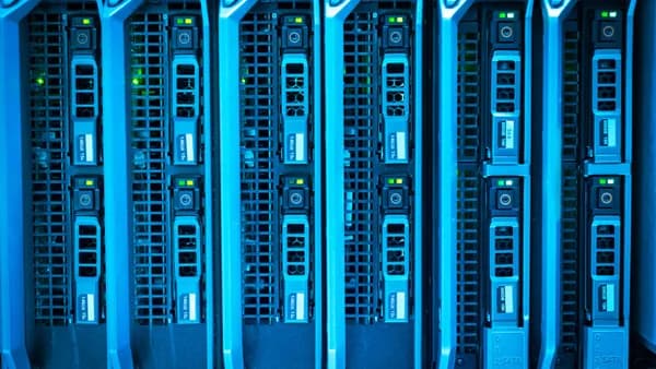 Detailed image of illuminated server racks showcasing modern technology infrastructure.