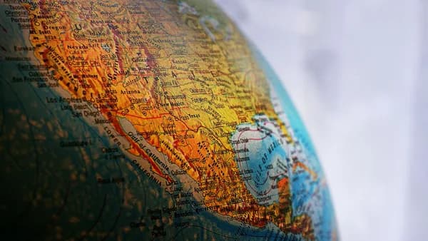 Close-up of a globe highlighting North America, showcasing geography and cartography details.
