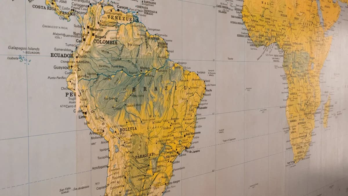 Close-up of a vintage-style map highlighting South America and parts of Africa.
