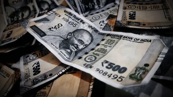 Close-up of Indian rupee notes illustrating abundance and financial concepts.