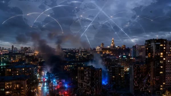 Kyiv skyline at night with smoke, emergency lights, drones, and global map overlay after strikes