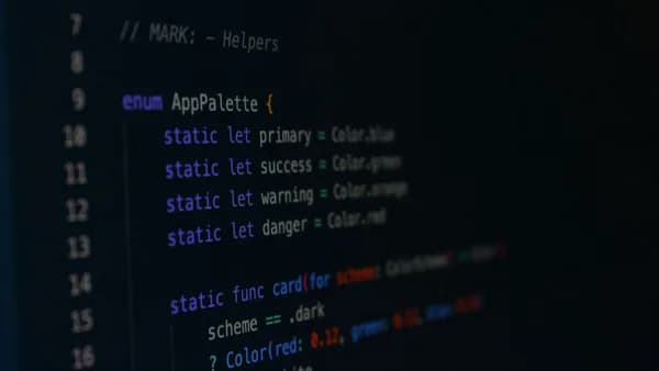 Macro photography of color palette code in a programming environment.