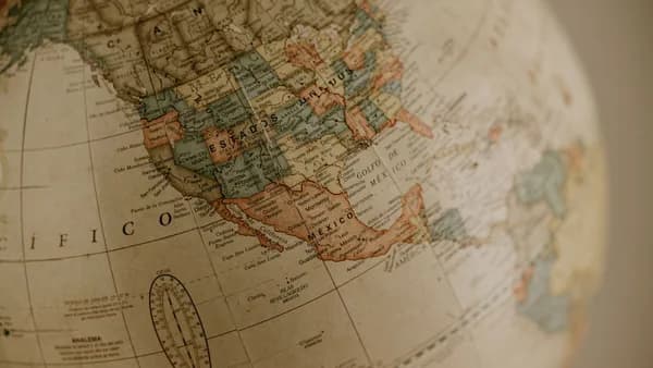 A vintage globe focusing on North America and Mexico with an antique aesthetic.