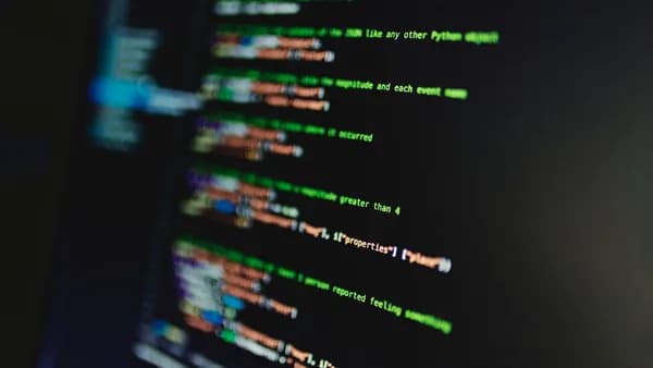 Colorful lines of code on a computer screen showcasing programming and technology focus.