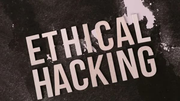 Creative depiction of the term 'Ethical Hacking' on a dark artistic background.