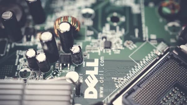Detailed view of a circuit board showcasing electronic components like capacitors.