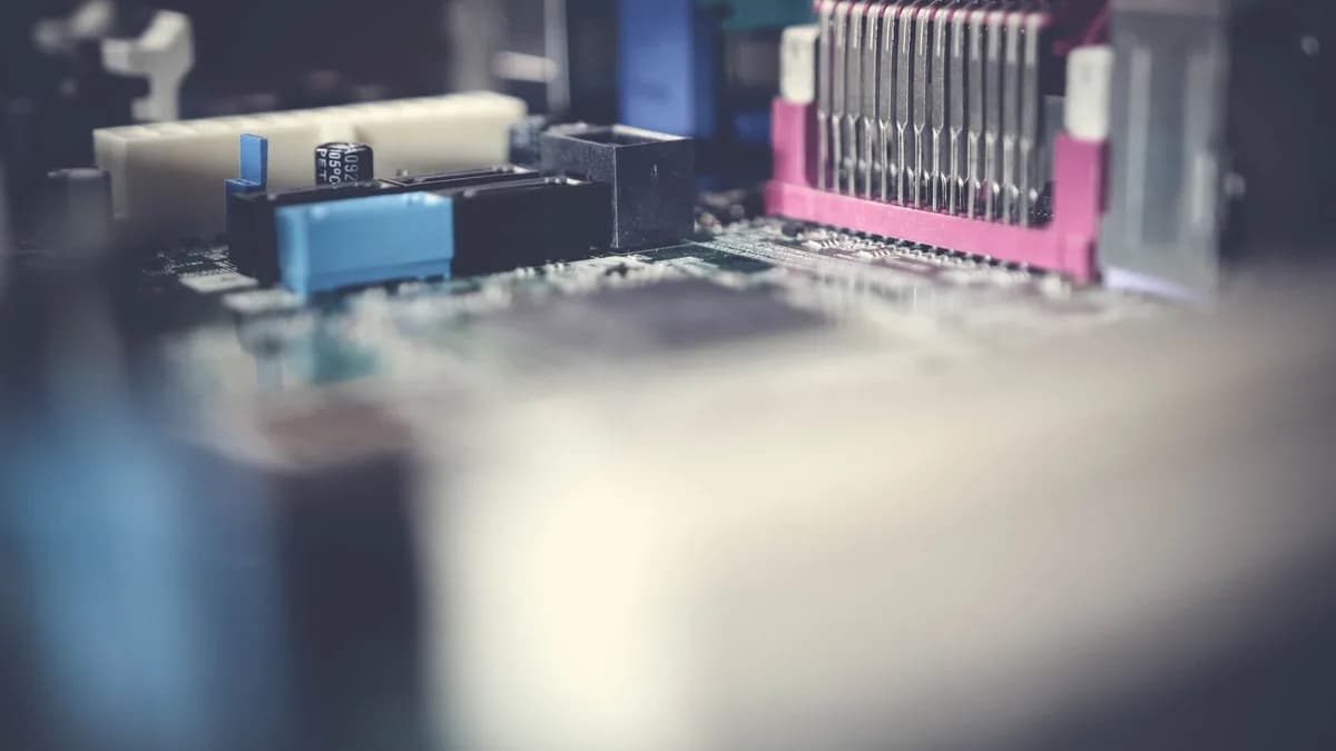Detailed close-up of a circuit board showcasing electronic components in soft focus.