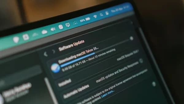Macbook screen shows macos software update downloading