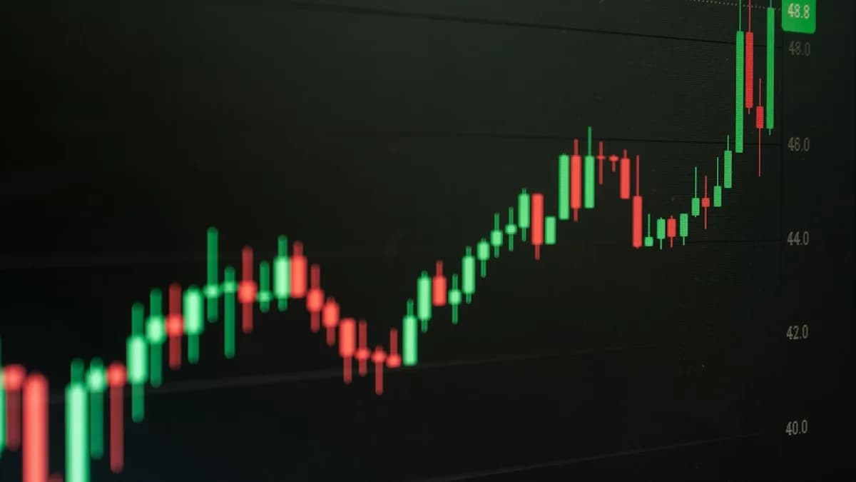 Stock chart indicates growth and potential profit.