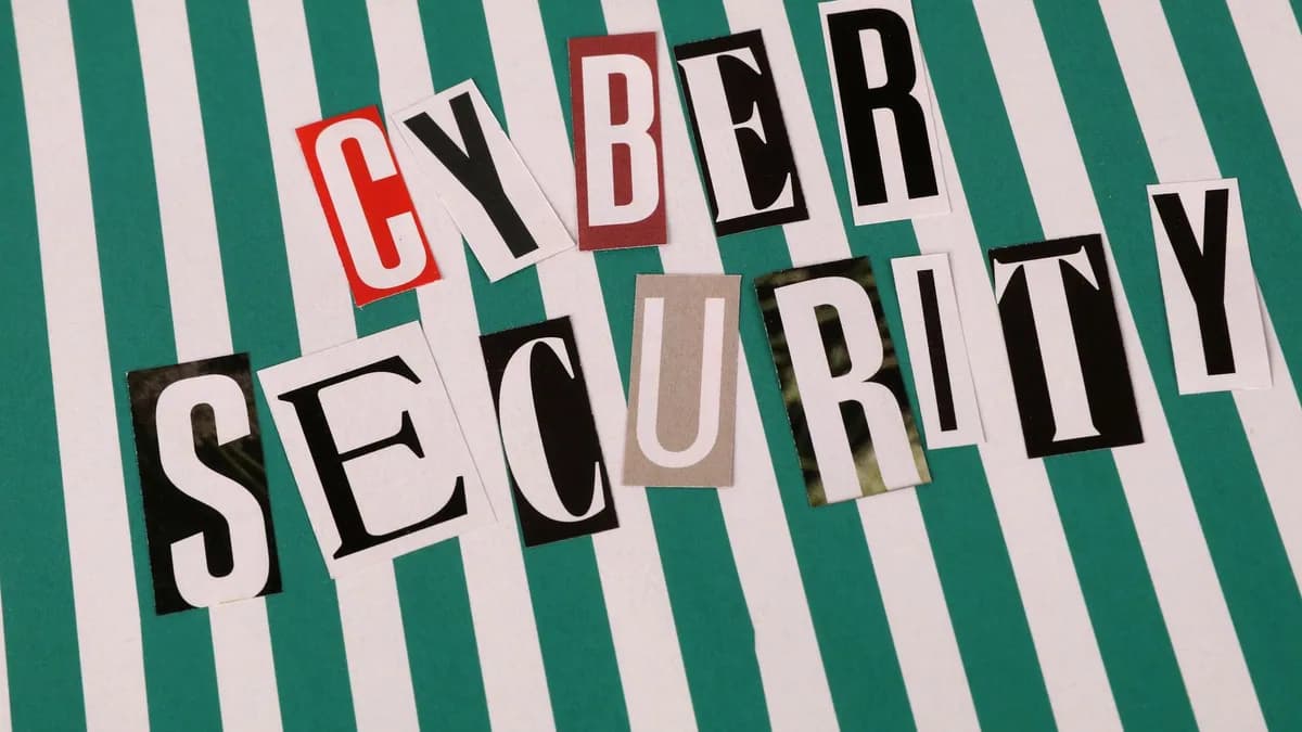 Cyber security concept depicted with a creative text collage on striped background.