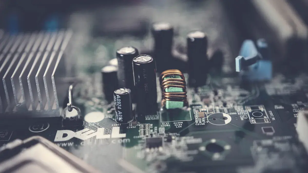 Detailed close-up of a motherboard showcasing electronic components and circuits.