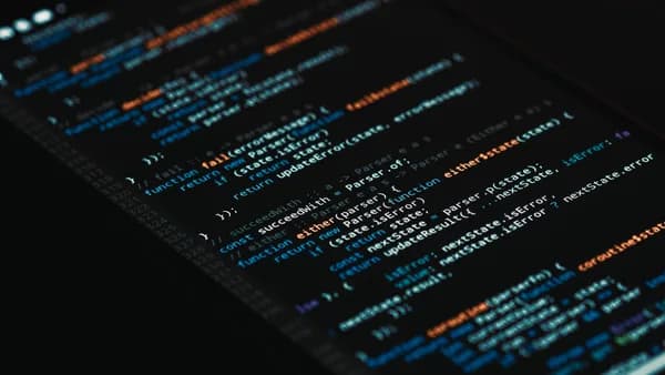 A detailed view of computer programming code on a screen, showcasing software development.