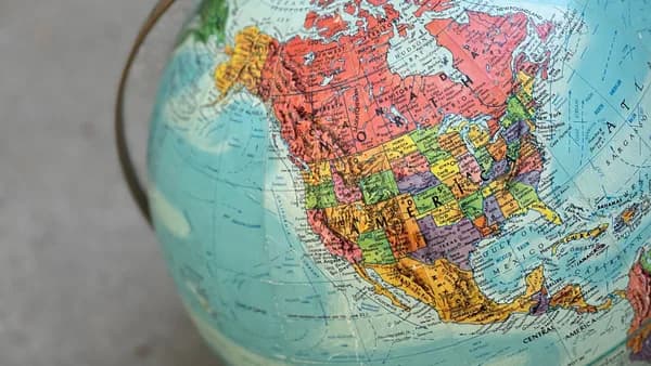 Close-up of a vintage globe showcasing North America with vibrant colors and detail.