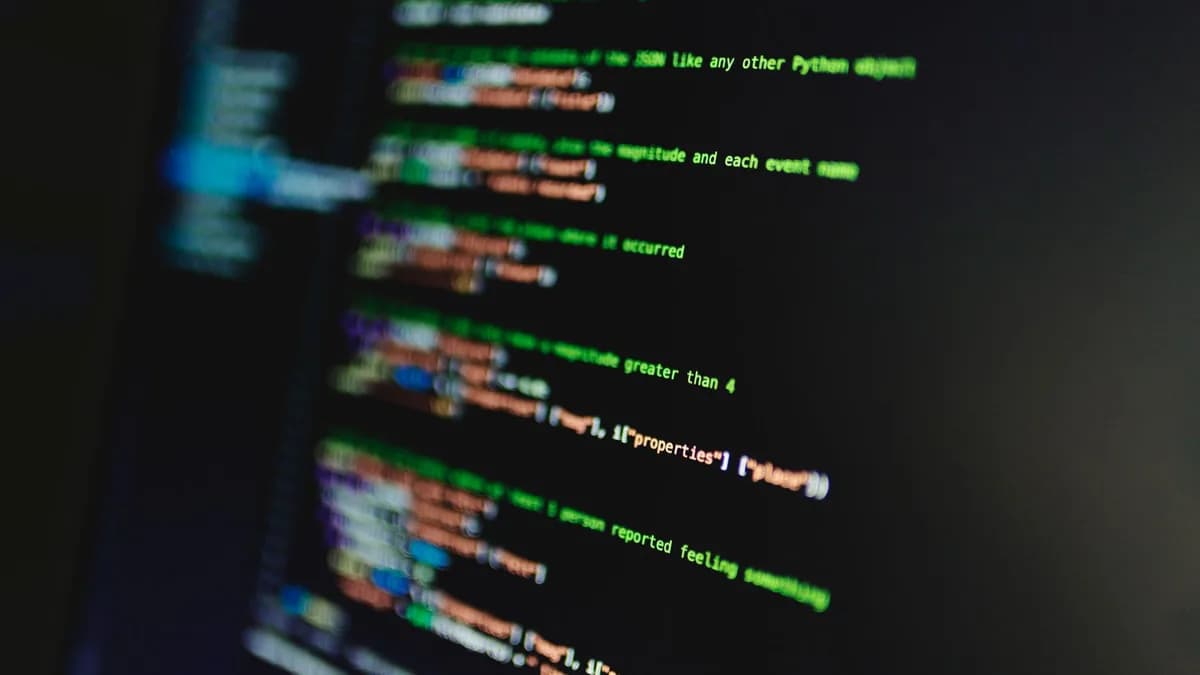Colorful lines of code on a computer screen showcasing programming and technology focus.