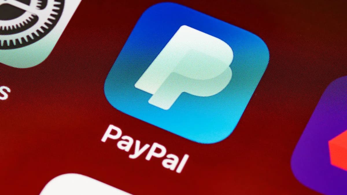 Detailed view of PayPal app icon on a smartphone screen highlighting mobile payment technology.