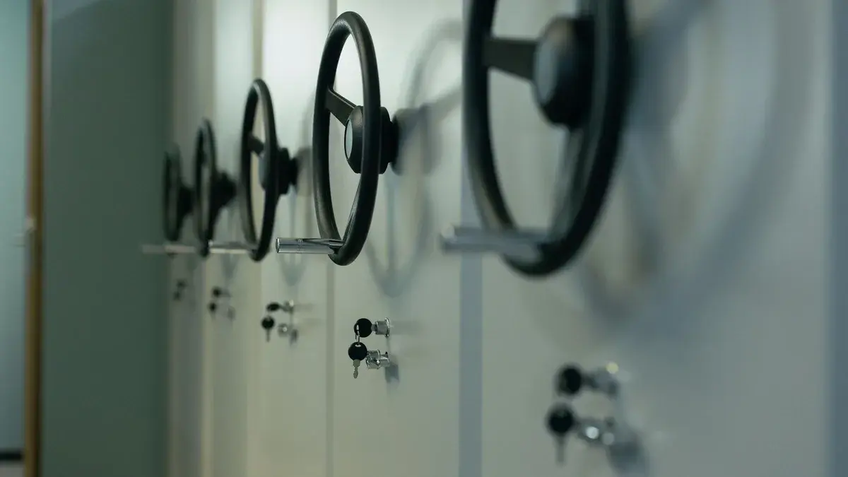 Close-up of industrial safes with manual locks and keys, highlighting security features.