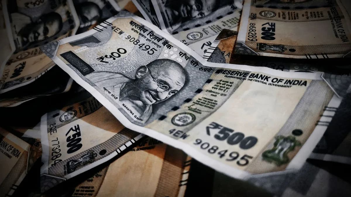 Close-up of Indian rupee notes illustrating abundance and financial concepts.