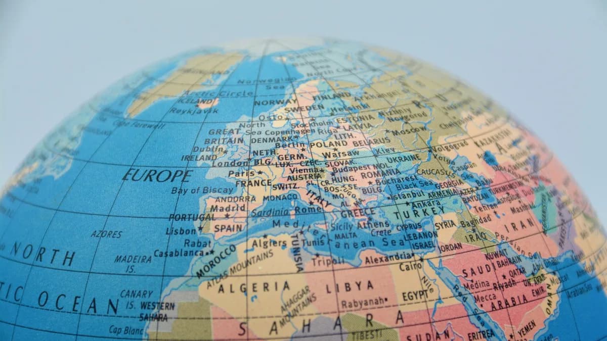 A close-up of a globe showcasing Europe, North Africa, and surrounding seas.