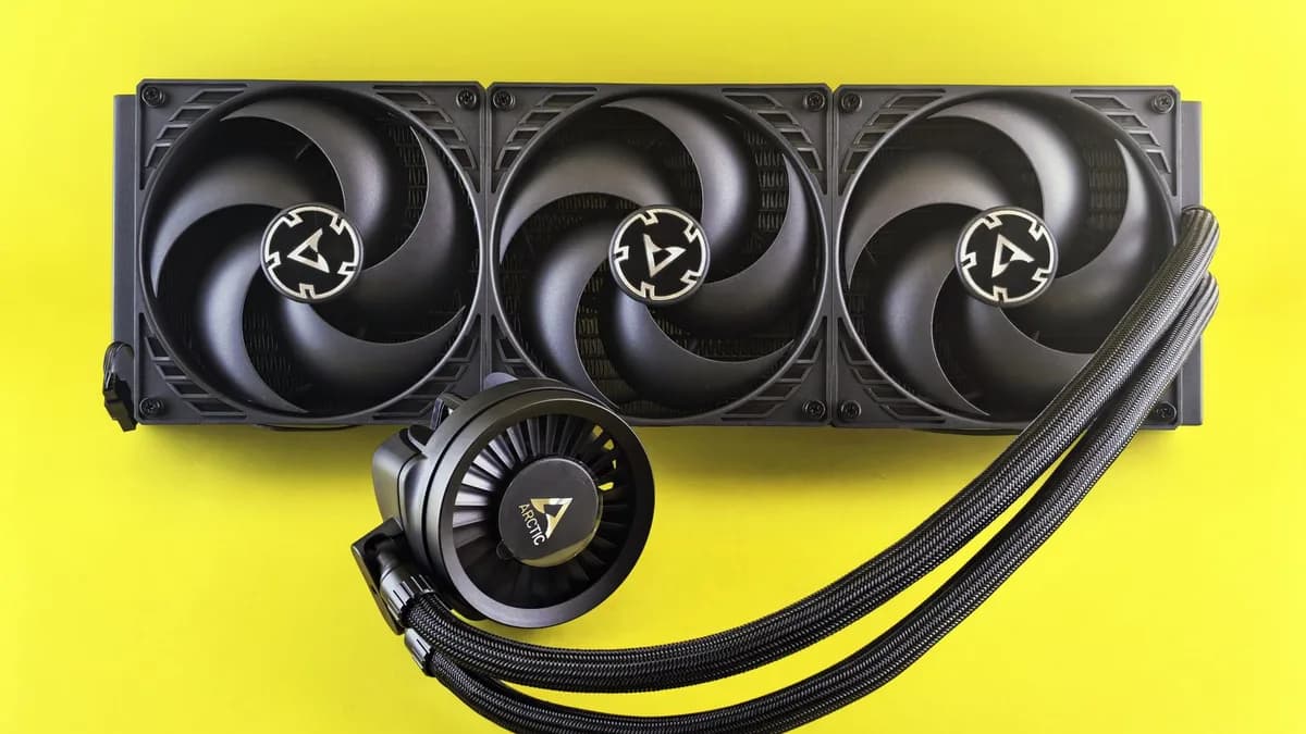 Triple fan CPU cooler with colorful background, efficient for gaming PCs.