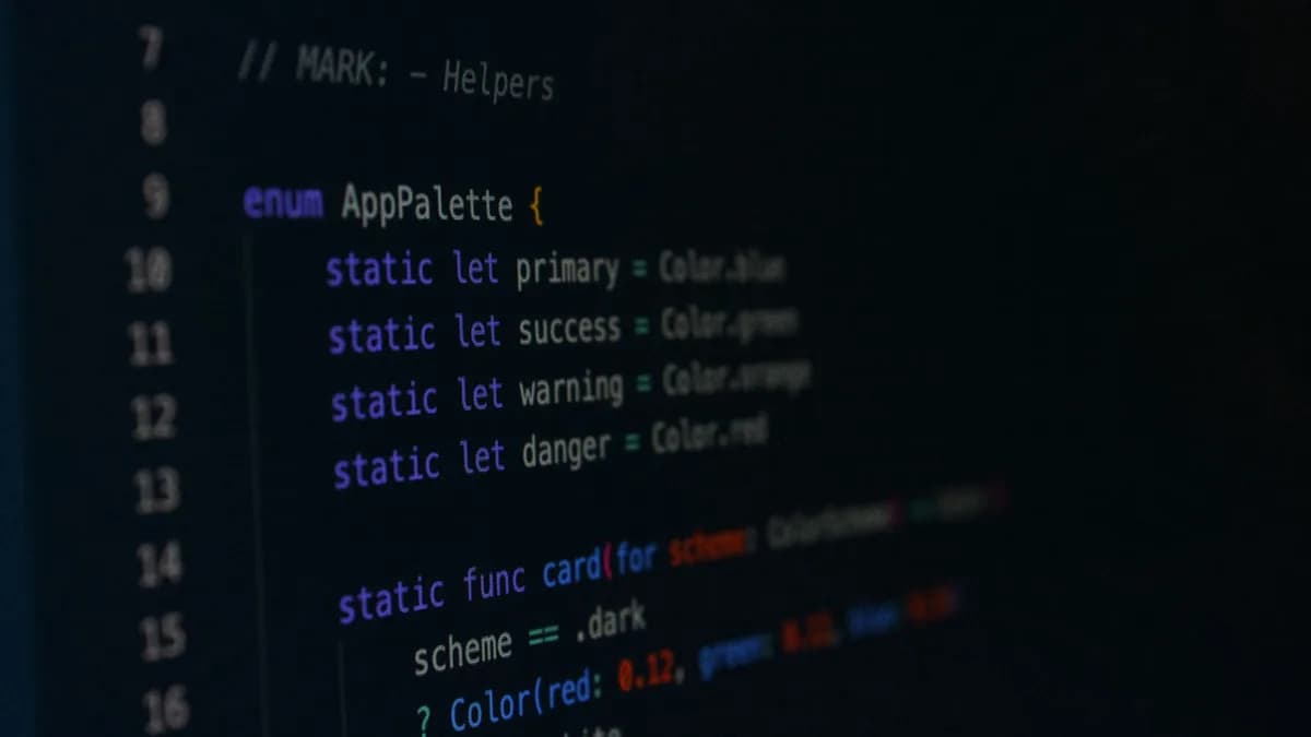Macro photography of color palette code in a programming environment.