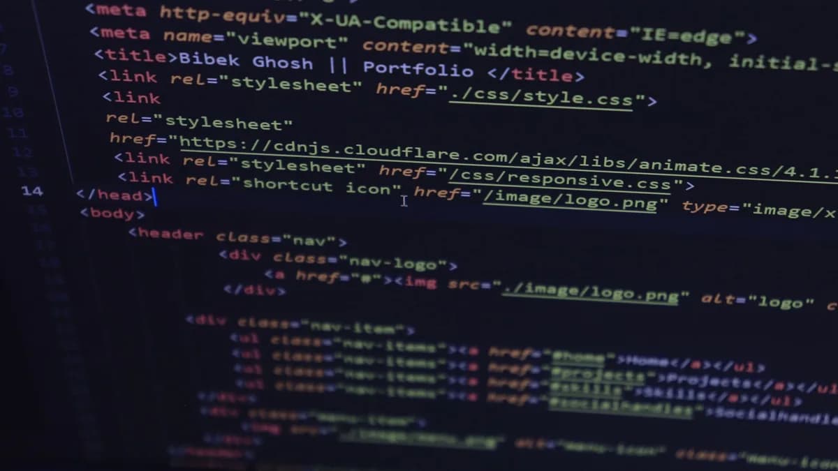 Close-up of HTML and CSS code displayed on a computer screen, ideal for tech and programming themes.