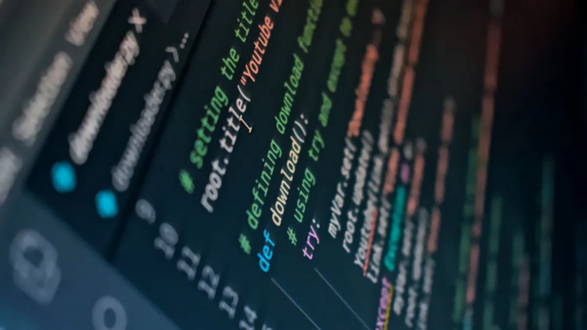 Detailed view of computer code highlighting syntax in colors on a screen.