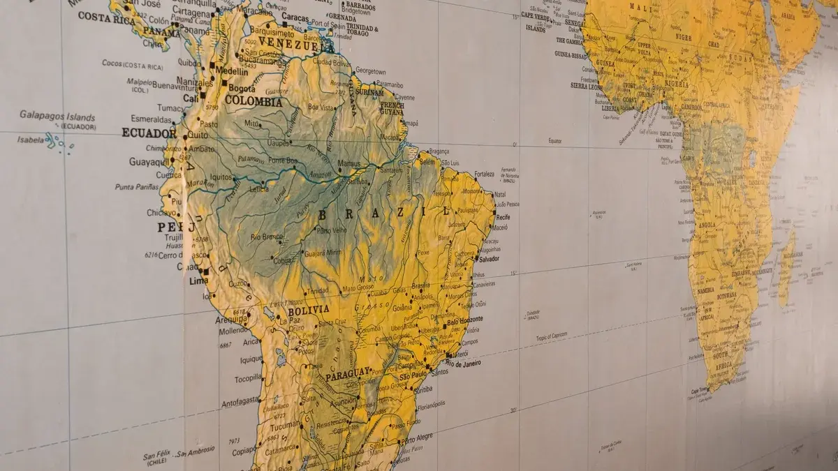 Close-up of a vintage-style map highlighting South America and parts of Africa.