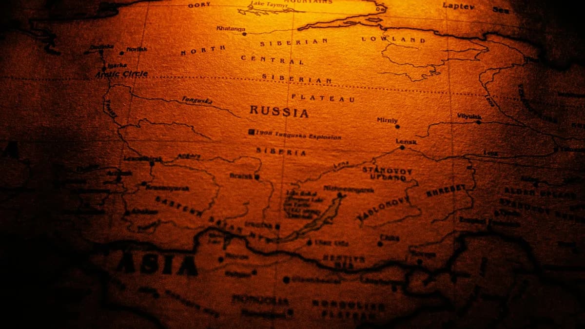 Close-up of a sepia toned vintage map highlighting Russia and Siberia.