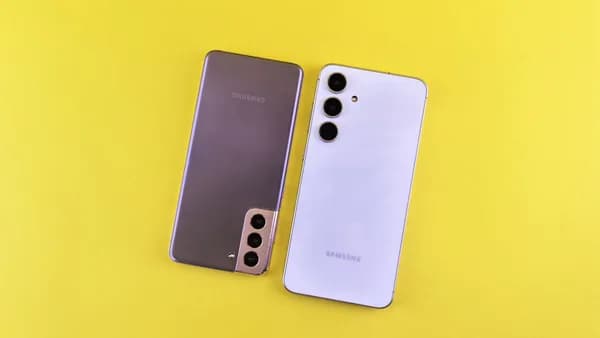 Pair of modern smartphones displayed on a vibrant yellow background highlighting sleek design.