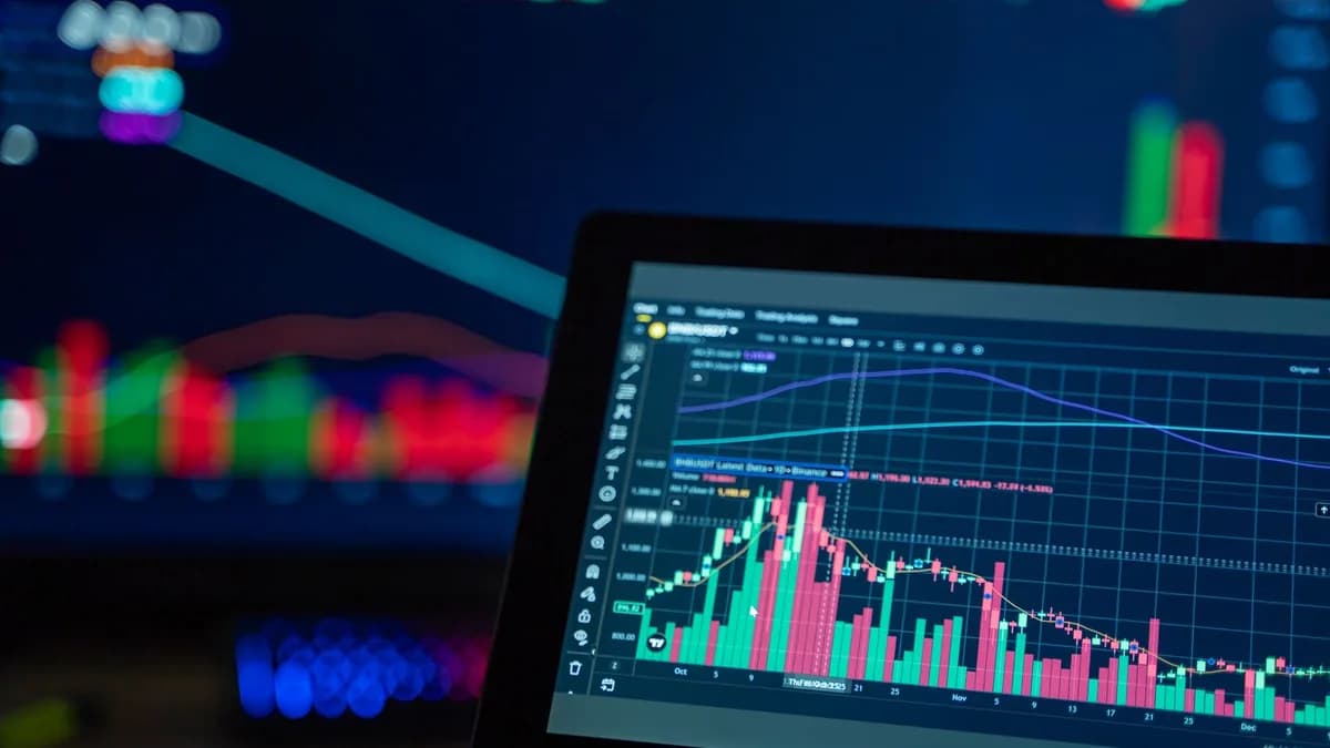 Colorful trading charts showing cryptocurrency market trends on a computer screen.