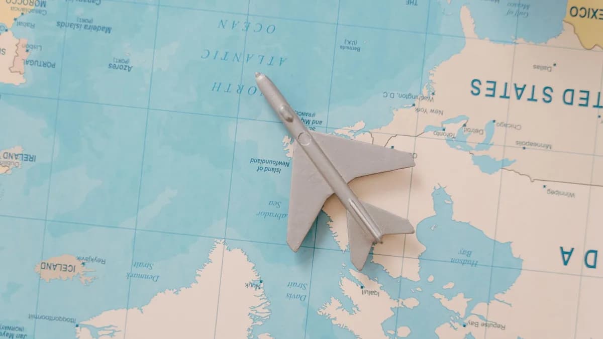 A toy airplane resting on a map, symbolizing travel and adventure planning.