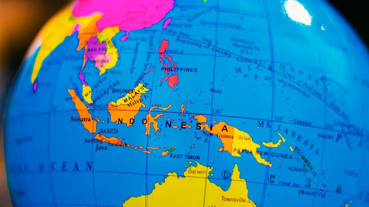 A vibrant globe highlighting Indonesia and surrounding countries in Southeast Asia and Australia.