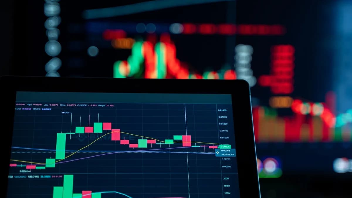 Close-up view of digital trading chart screen with vibrant graphs and data analysis.